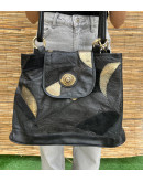 Vintage black leather bag with golden details 