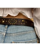 Vintage leather belt with metallic and shiny details 