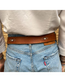Vintage leather belt with metallic and shiny details 